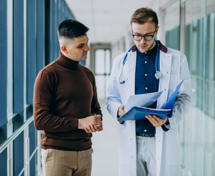 patient looking at report