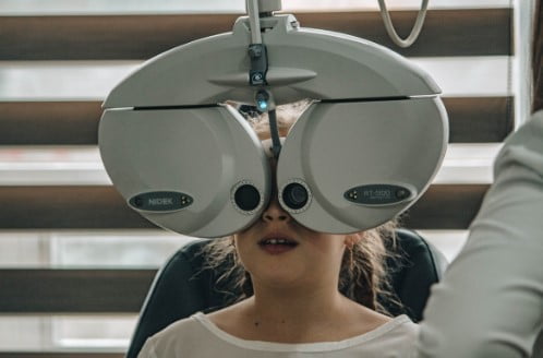 Child undergoing an eye exam in Northeastern Pennsylvania.